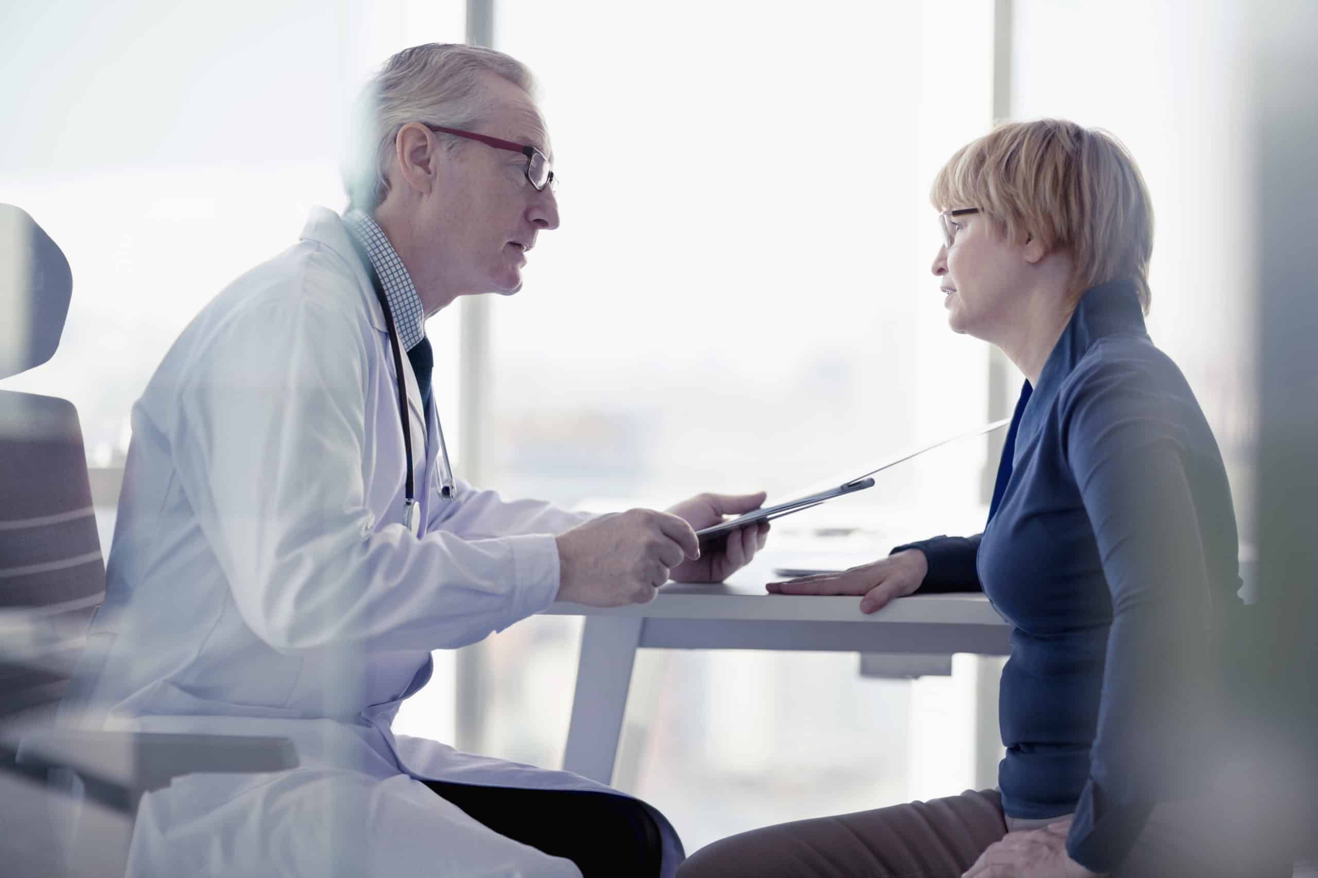 A doctor going over results with a patient