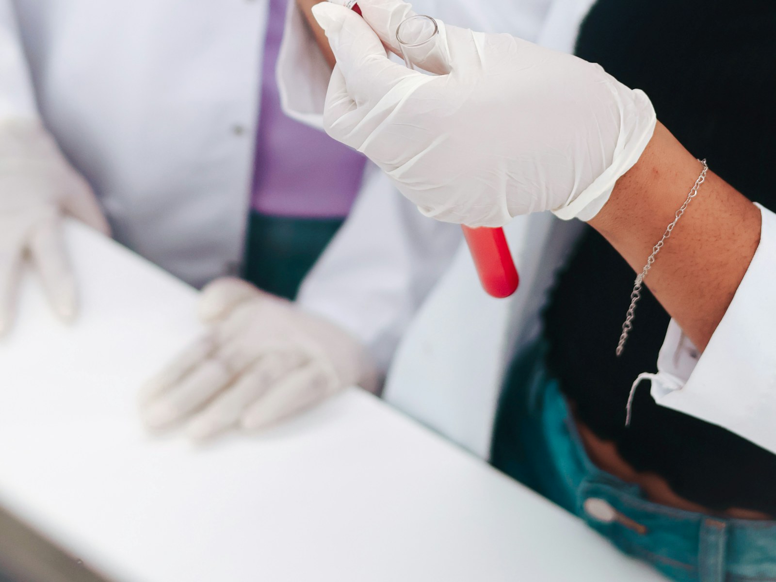 A clinician preparing a blood draw