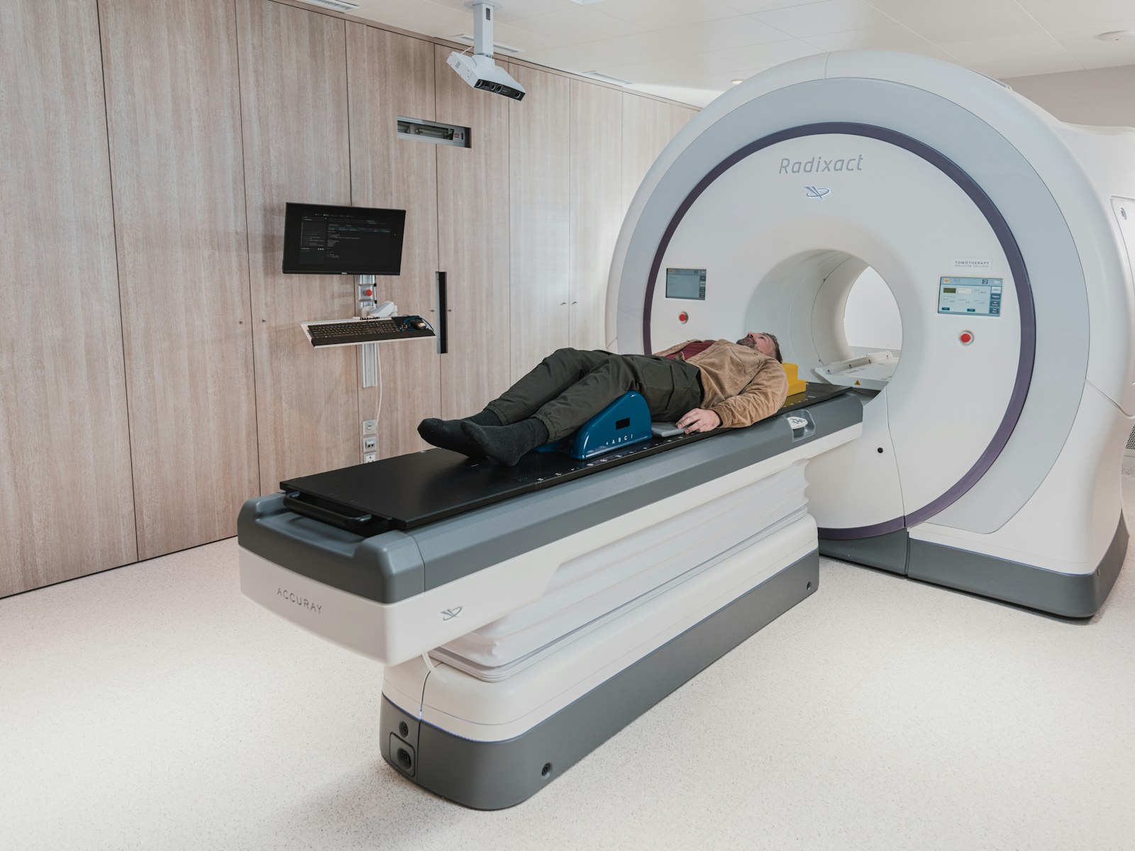 A patient being positioned for a CT scan