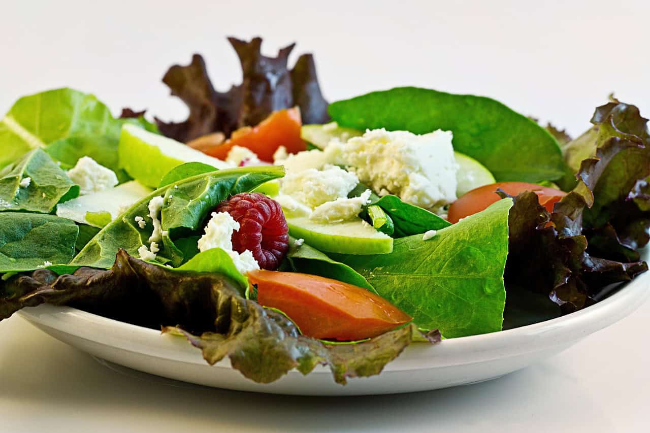 A fresh green salad with vegetables on a plate